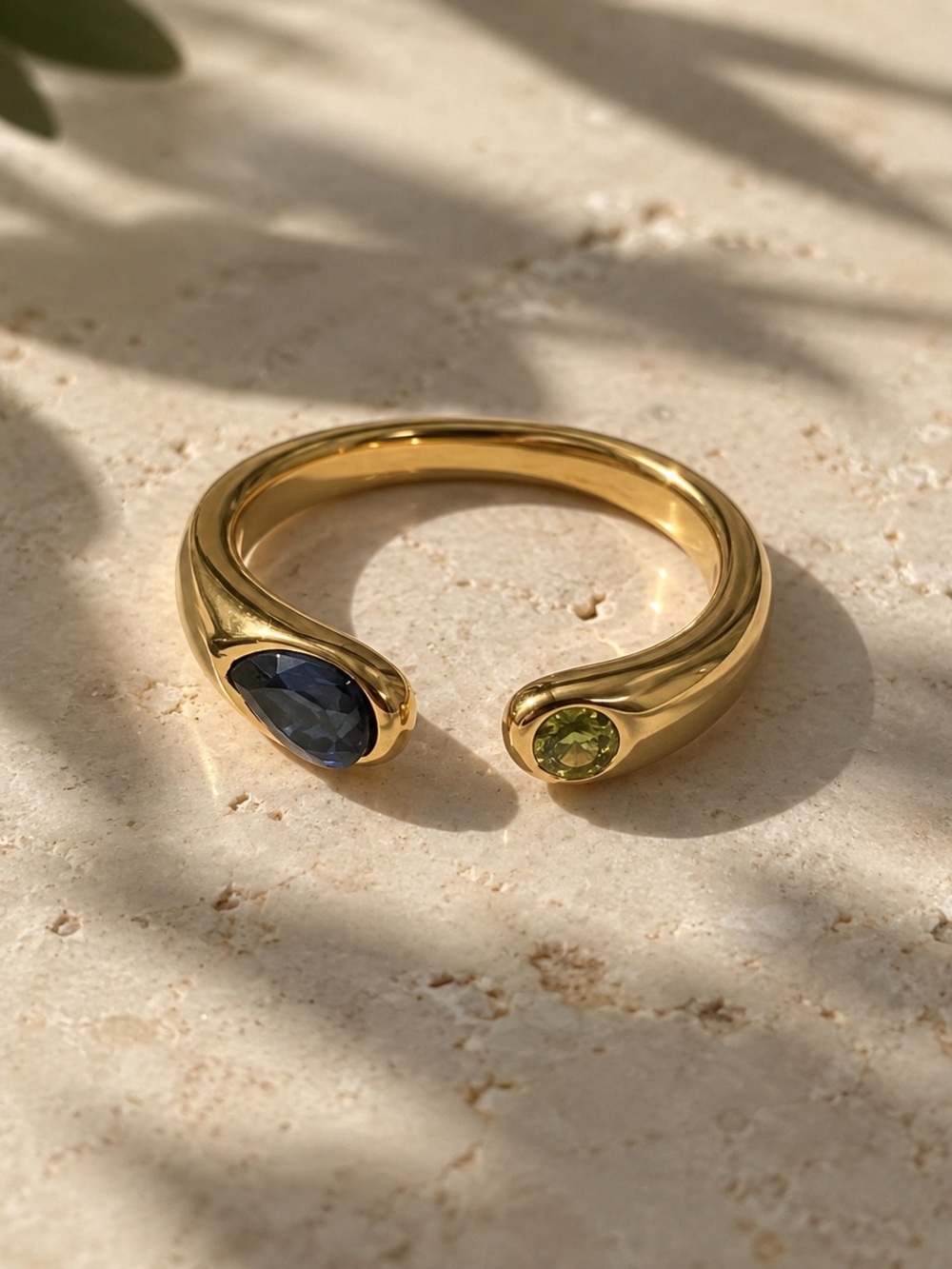 Gold Open Band Ring with Blue Teardrop and Green Round Gemstones
